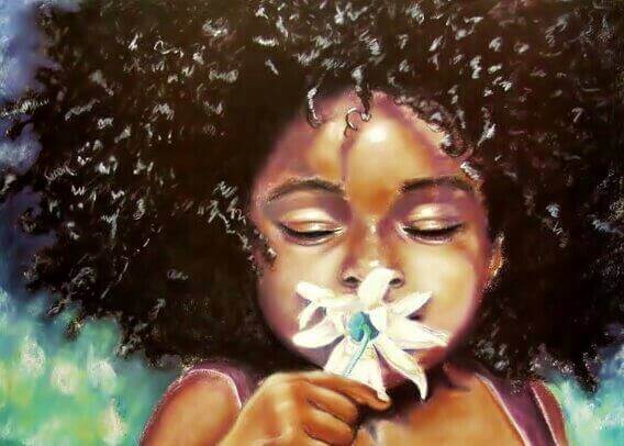 girl-smelling-flower