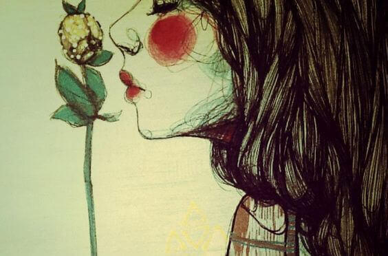 花を嗅ぐ女性