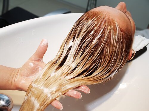 applying hair treatment
