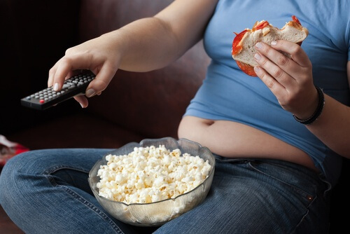 sedentary person with food