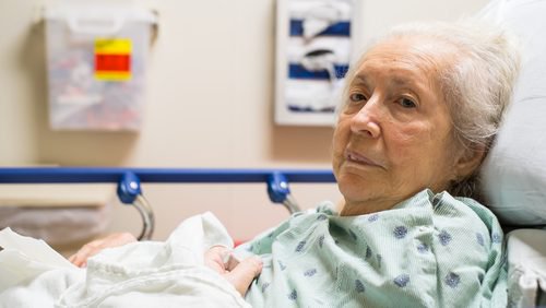grandma lying on bed