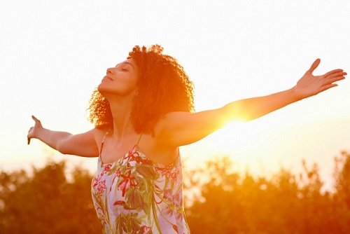 opening arms to sky